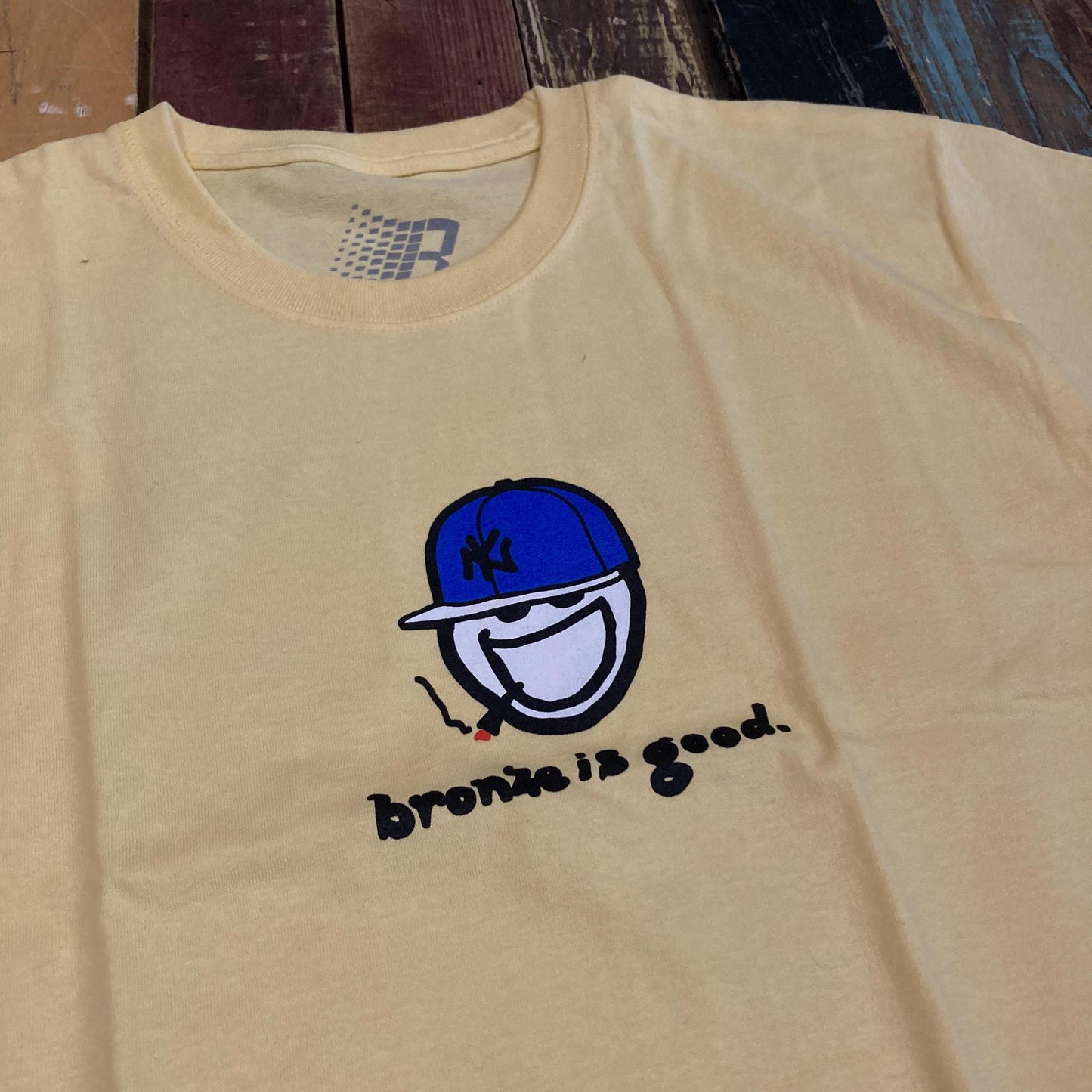 BRONZE IS GOOD TEE DAFFODIL YELLOW