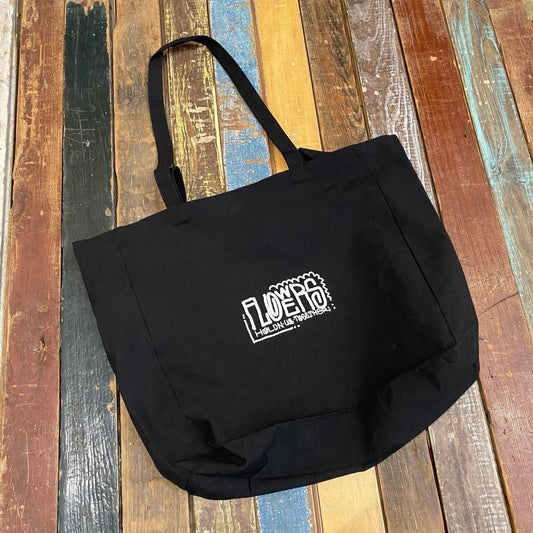 Flowers Holding Us Together Tote Bag