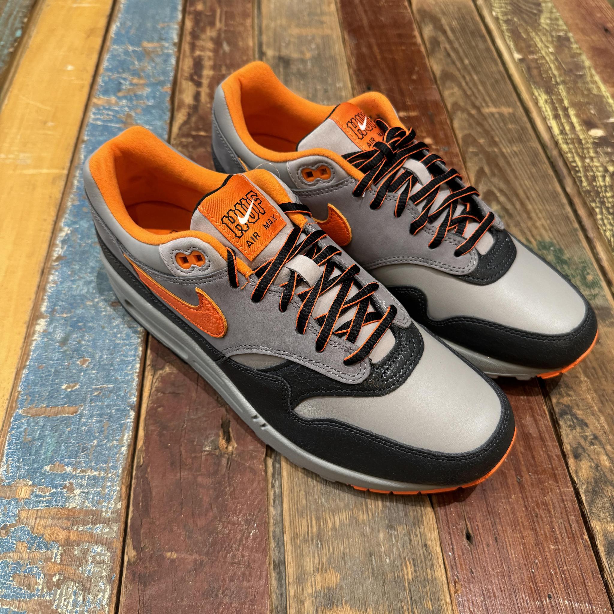 Nike shoes grey and orange best sale